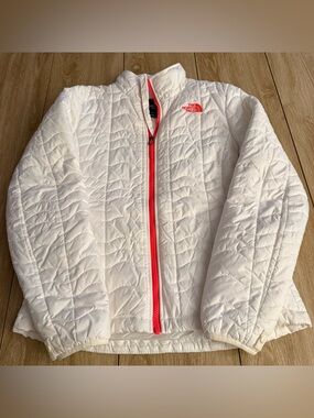 The North Face White Quilted Puffer Jacket with Orange Zipper
